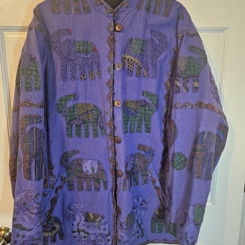 Silverstream one size fits all  revesable jacket.